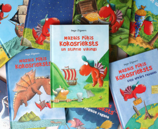 Nākusi klajā jau četrpadsmitā grāmata sērijā par mazo pūķi Kokosriekstu