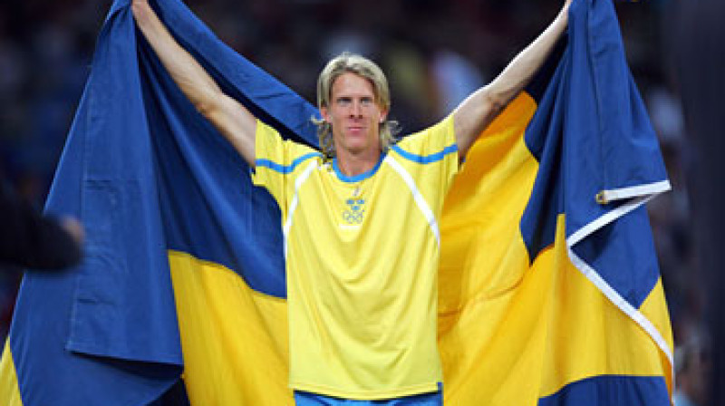 Kristians Olsons pēc uzvaras Olimpsikajās spēlēs Atēnās 2004.gadā
Frank Fife/AFP
