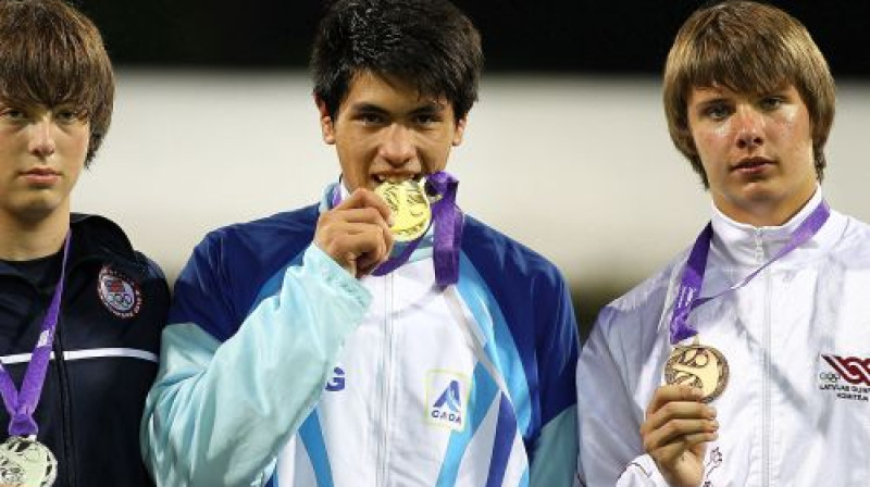 Intars Išējevs ar medaļu
Foto: XINHUA/SYOGOC-Pool/Liao Yujie