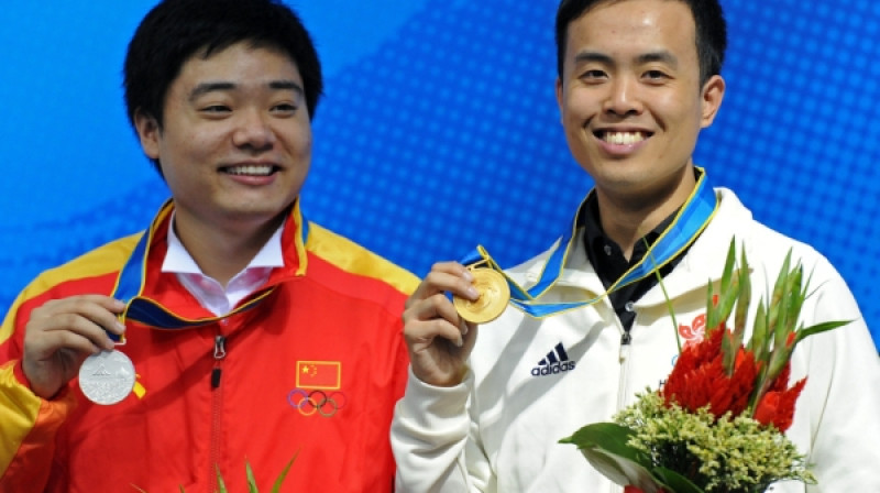 No kreisās: Dings Junhui un Marko Fu
Foto: AFP/Scanpix