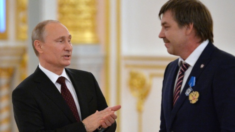 Vladimirs Putins un Oļegs Znaroks
Foto: AFP/Scanpix