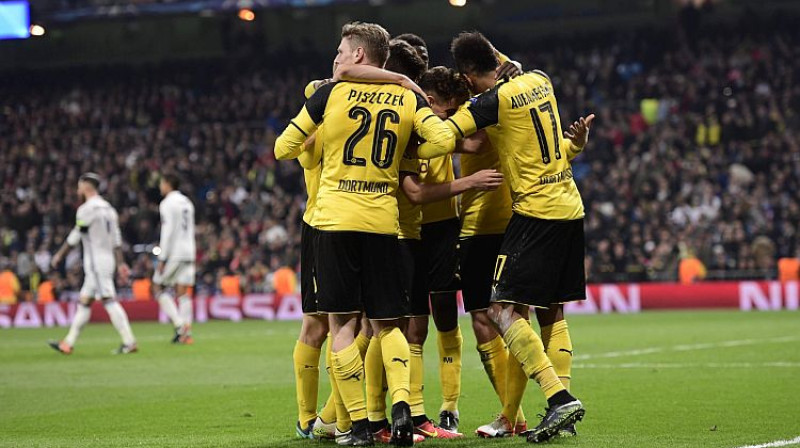 Dortmundes ''Borussia'' futbolisti atzīmē vārtu guvumu
Foto: AFP/Scanpix