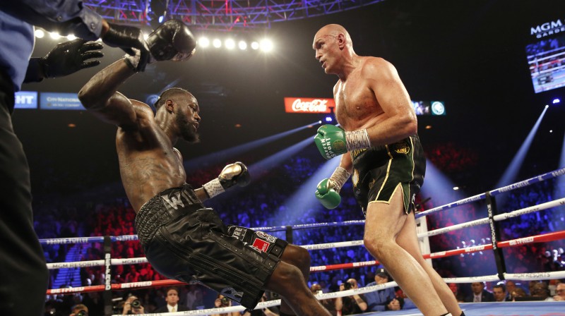 Taisons Fjūrijs pret Deonteju Vailderu. Foto: Reuters/Scanpix